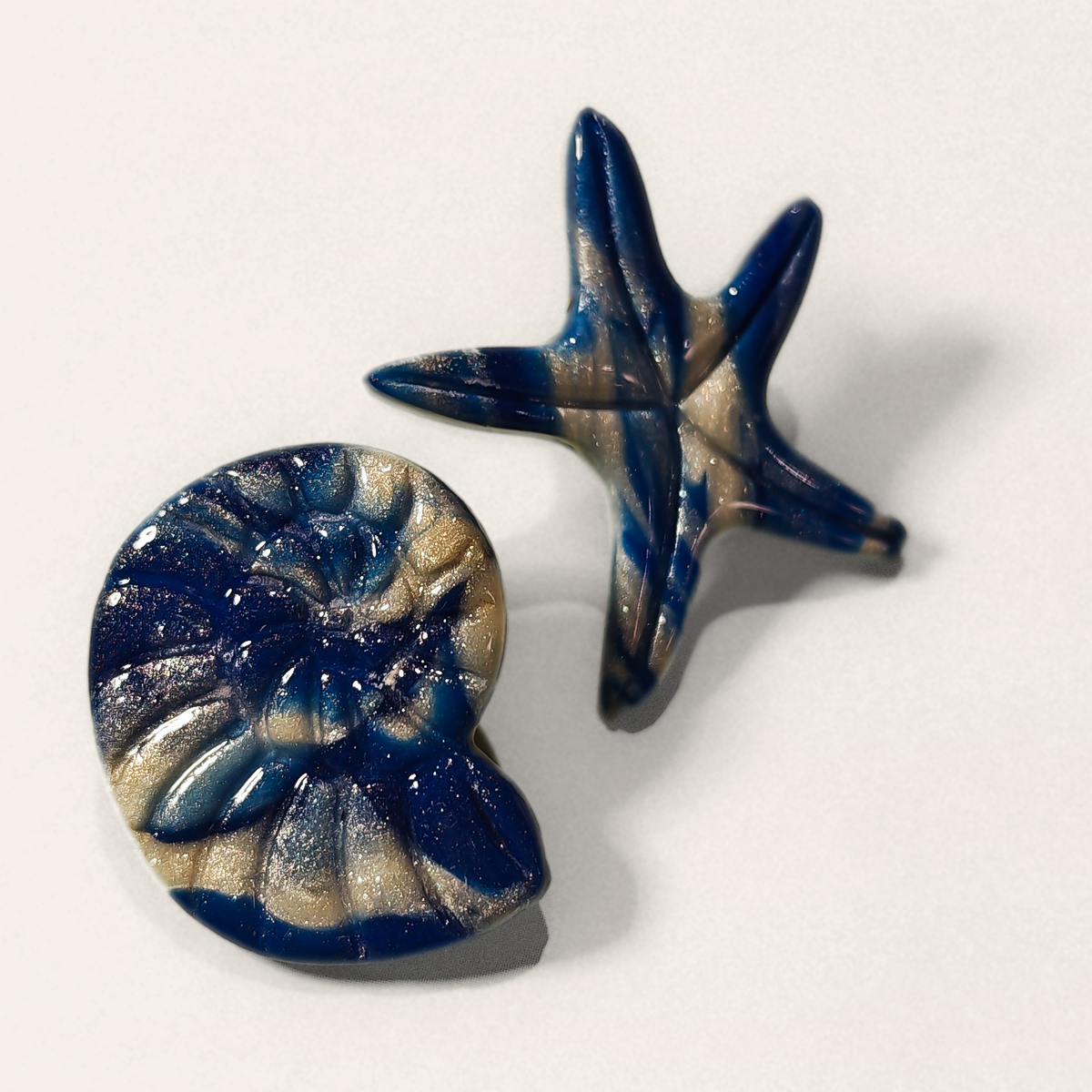 Navy Shell & Starfish Mismatched Stud Earrings, close view of the shapes and texture