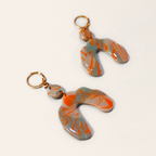 Orange & Grey Marble Arch Hoop Earrings, angled view showing the pattern