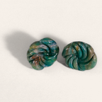 Green marbled round polymer clay studs with spiral ridges, front view
