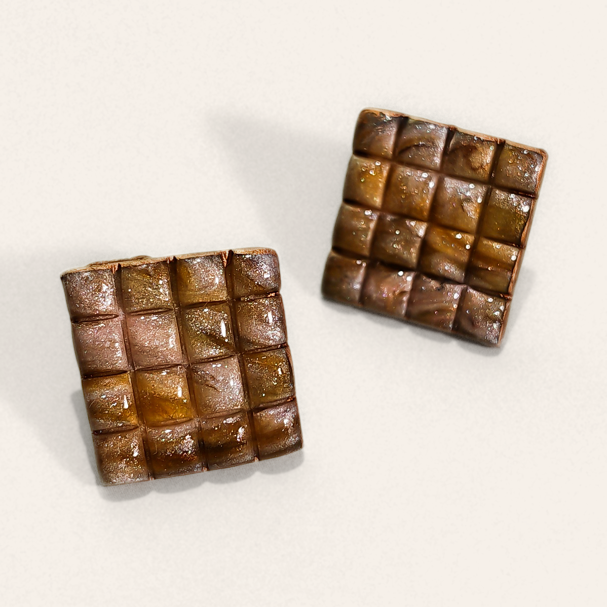 Brown Textured Grid Square Stud Earrings, angled view showing the pattern