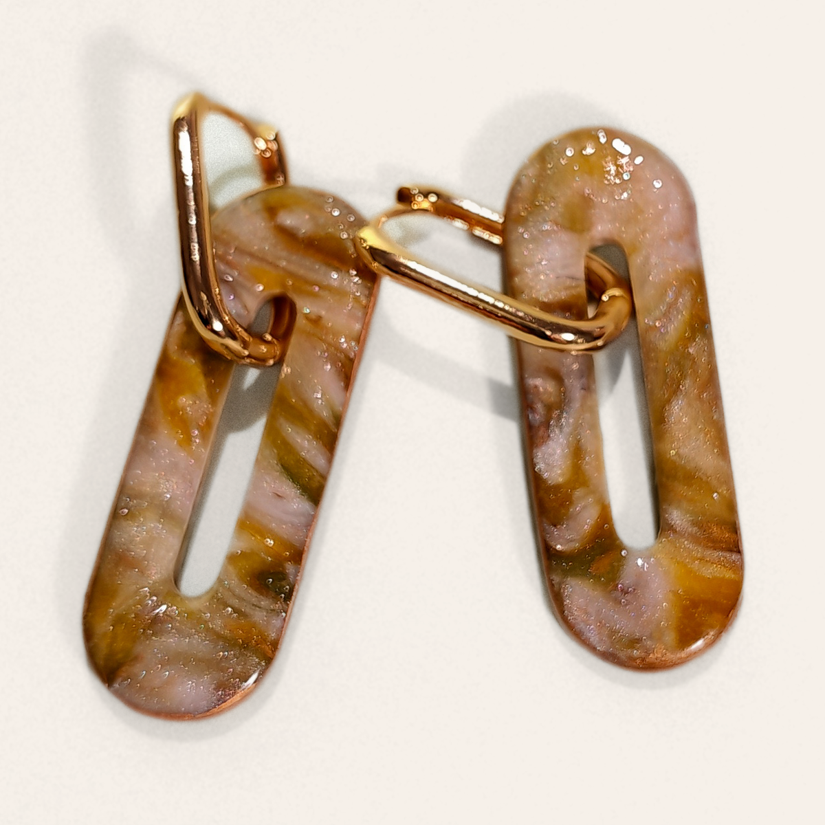 Brown Marble Cut-Out Oblong Hoop Earrings, close view of the shapes and texture