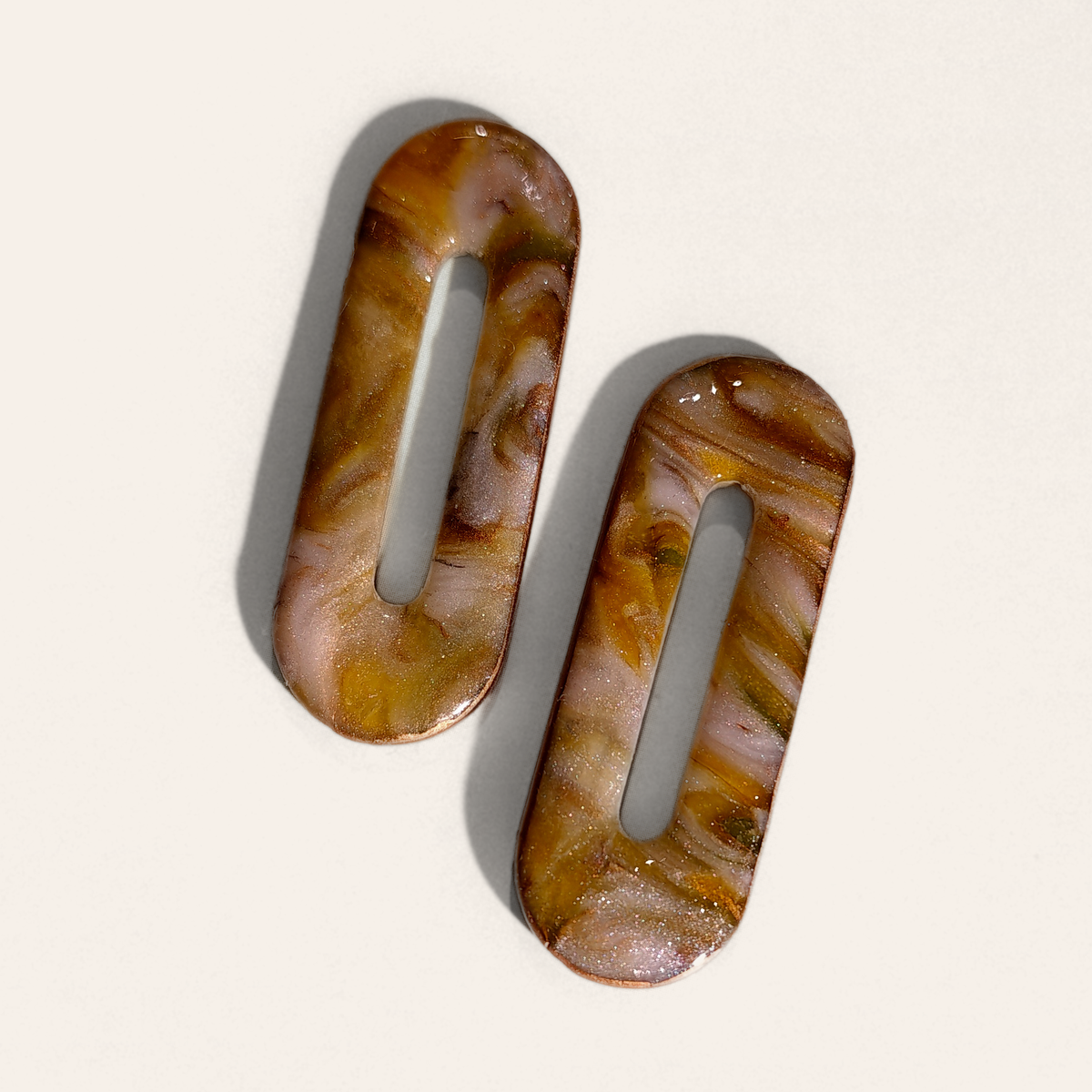 Brown Marble Cut-Out Oblong clay pieces without hardware, angled view