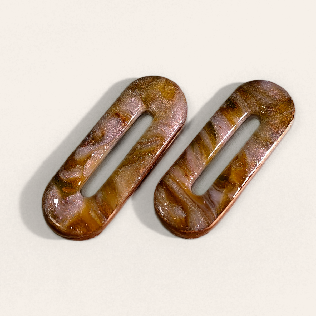 Brown Marble Cut-Out Oblong clay pieces without hardware, angled view