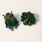 Green Marble Beetle Stud Earrings, angled view showing the pattern