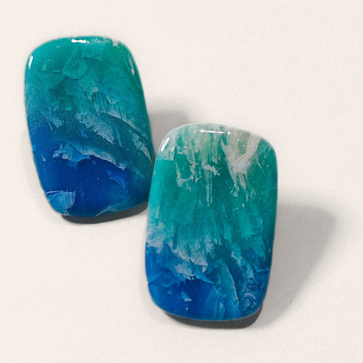 Teal & Blue Marble Rectangle Stud Earrings, angled view showing the pattern