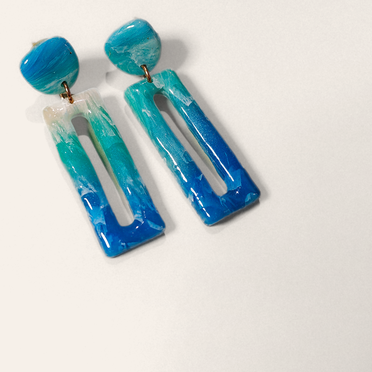 Blue & Turquoise Cut-Out Rectangle Drop Earrings, angled view showing the pattern