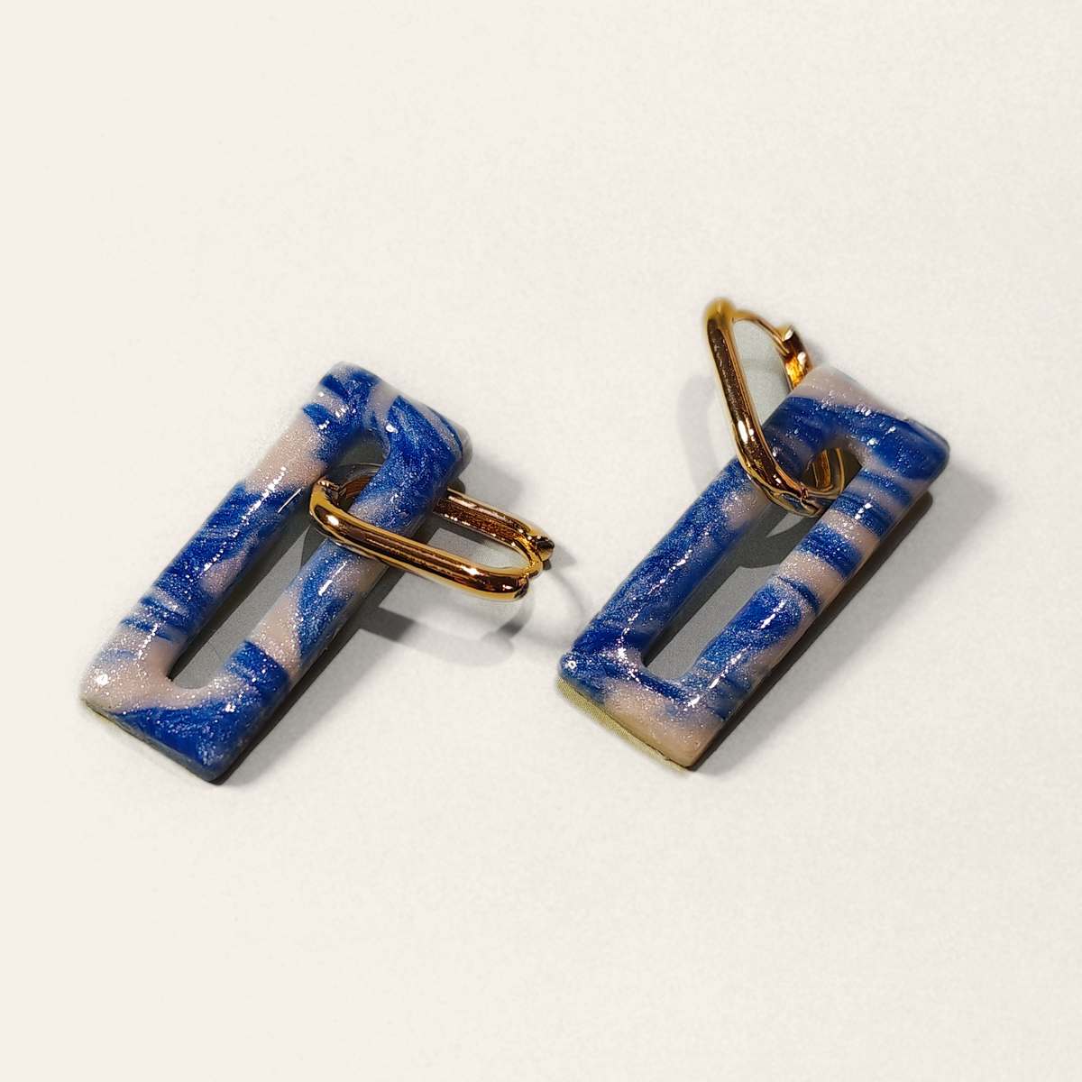 Blue & White Marble Rectangle Hoop Earrings, angled view showing the pattern
