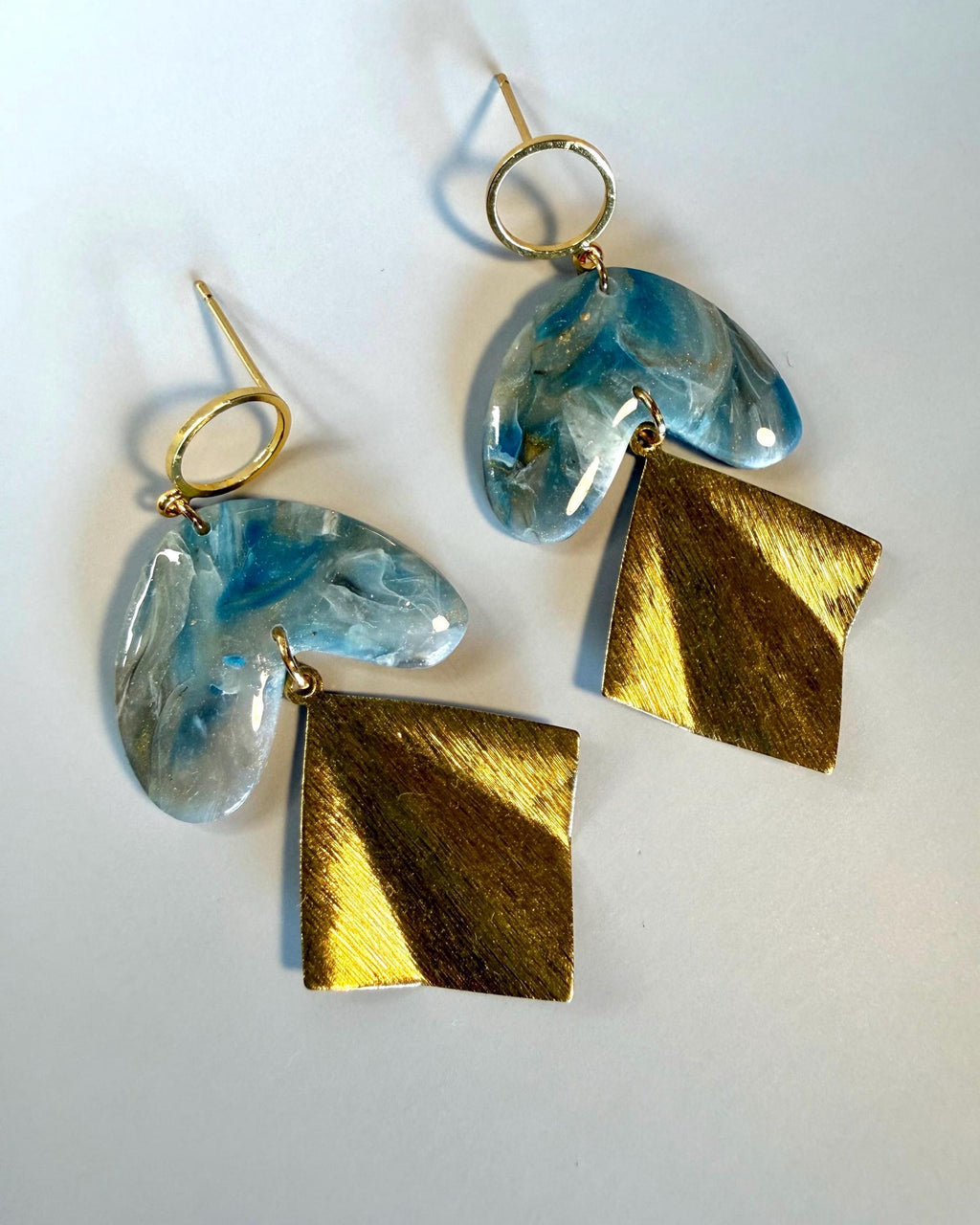Blue marble polymer clay dangle earrings with gold geometric drop by ToBe